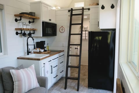 Climb the ladder up to a bonus room... the reading loft.