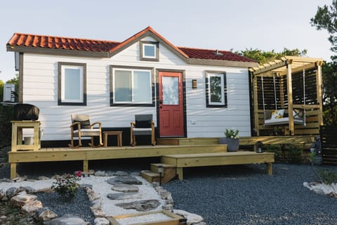 Sip your morning coffee in a comfortable rocking chair or on the couples' swing.