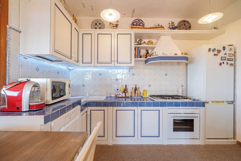 Apartment | Private kitchen | Full-size fridge, microwave, oven, stovetop