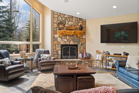Living room: Gas fireplace, Smart TV with cable, radiant floor heat, no A/C