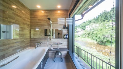 Traditional House, River View | Bathroom | Combined shower/tub, deep soaking tub, hair dryer, bathrobes