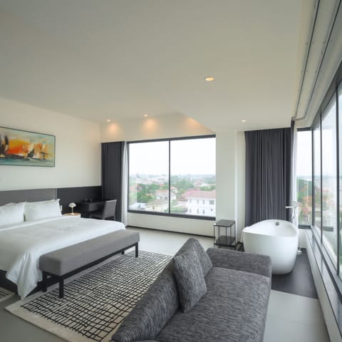 Two Bed Room Suite | Minibar, in-room safe, desk, blackout drapes