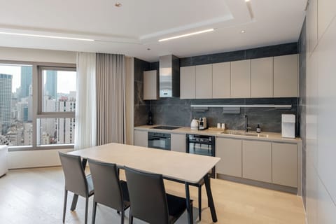 Royal Suite, City View | Private kitchen | Mini-fridge, microwave, espresso maker, electric kettle