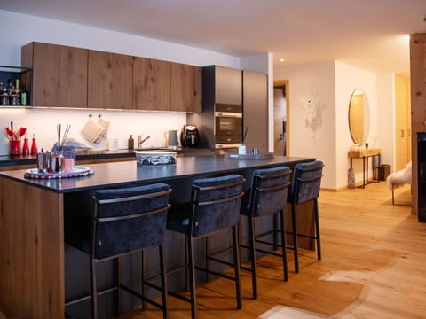 Property, Countertop, Cabinetry, Kitchen, Wood, Architecture, Interior Design, Building, Flooring, Floor