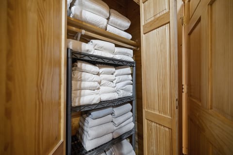 Linens for every bed are provided in the larger bunkroom closet.