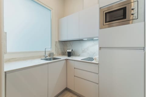 Luxury Apartment, Balcony, City View | Private kitchen | Full-size fridge, microwave, oven, stovetop