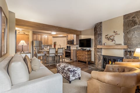 Living room with wood-burning fireplace