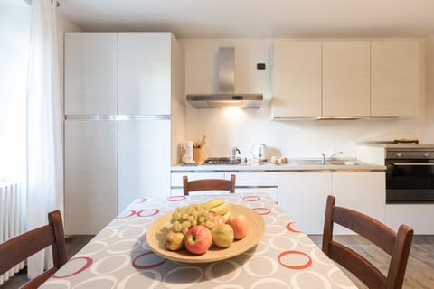 Apartment | Private kitchen | Electric kettle, dining tables