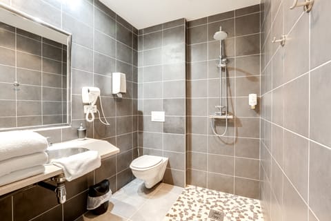 Quadruple Room (Suite for 4 per) | Bathroom | Hair dryer, towels