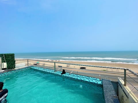 Indoor pool, pool umbrellas, sun loungers