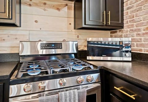 Our kitchen's blue flame and chic decor will inspire your inner chef to whip up delicious vacation meals.