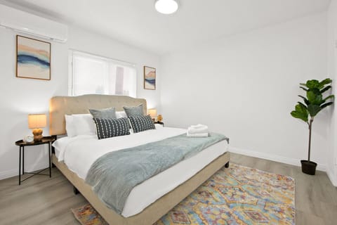 Sleep soundly in a king bed with convenient nightstands and lamps, and make use of the spacious walk-in closet.