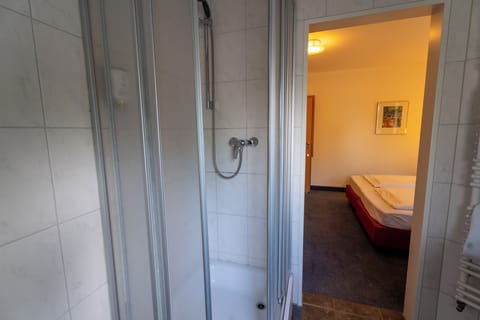 Classic Double Room | Bathroom | Shower, hair dryer, towels, soap