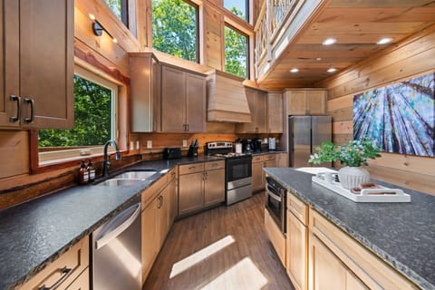 Cook like a pro in our fully equipped kitchen with modern appliances.