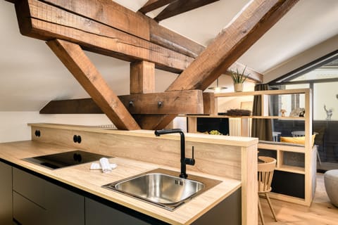 Münsterhaus in Schruns, holiday home, main bedroom with small kitchen, living and dining area