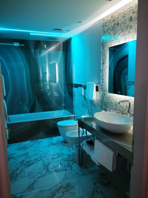 Premium Room (Roof Top) | Bathroom | Deep soaking tub, rainfall showerhead, free toiletries, hair dryer