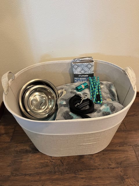 Supplies for your dogs; blankets, leashes, poop bags and food bowls