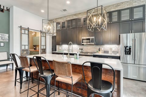 Sadie Street Expansive kitchen island offers additional seating