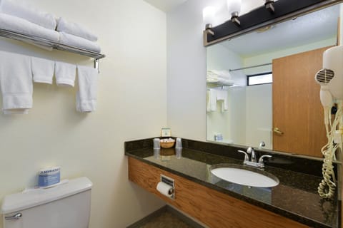 Combined shower/tub, hair dryer, towels, soap