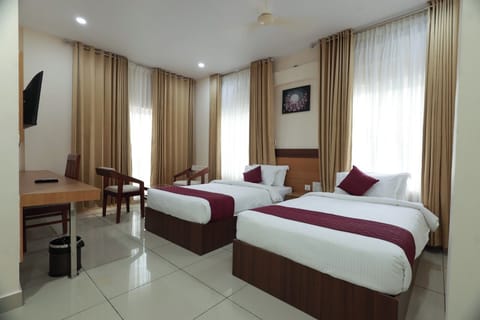 Deluxe Twin Room, City View | In-room safe, soundproofing, iron/ironing board, free WiFi