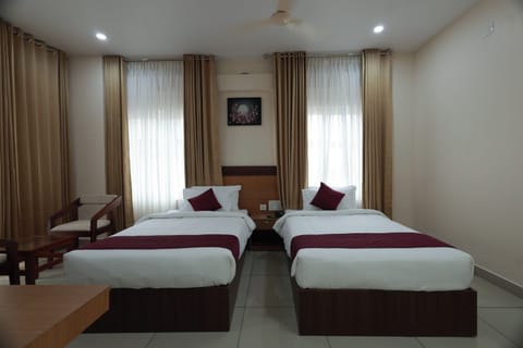 Deluxe Twin Room, City View | In-room safe, soundproofing, iron/ironing board, free WiFi