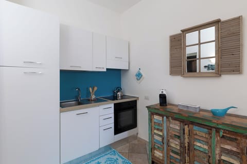 Apartment, Sea View | Private kitchen | Fridge, microwave, stovetop, dishwasher