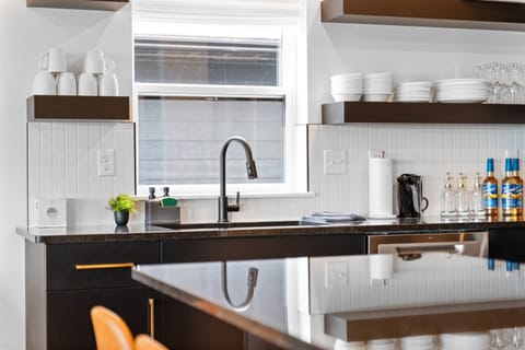 Cook, dine, and hang out in a stylish kitchen made for family gatherings!