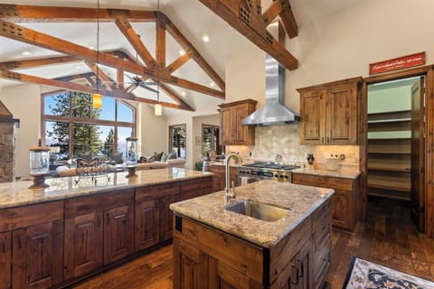 This spacious kitchen is well-equipped with all the essentials you need to cook delicious meals during your stay in Lake Tahoe. The large island provides ample counter space for meal prep and entertaining guests.