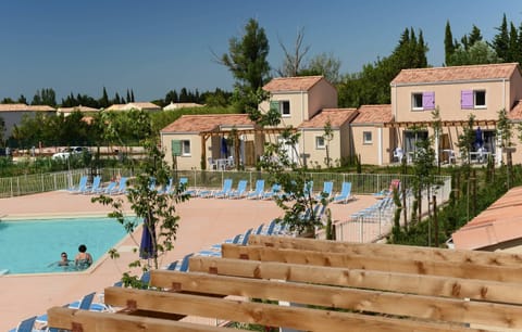Lounge by the pool in the sunshine.