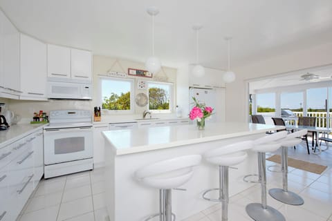 Villa | Private kitchen | Full-size fridge, microwave, oven, stovetop