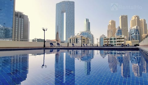 Outdoor pool, open 10:00 AM to 6:00 PM, pool umbrellas, sun loungers