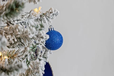 A beautifully styled Christmas tree adds the perfect touch of holiday magic to your stay.