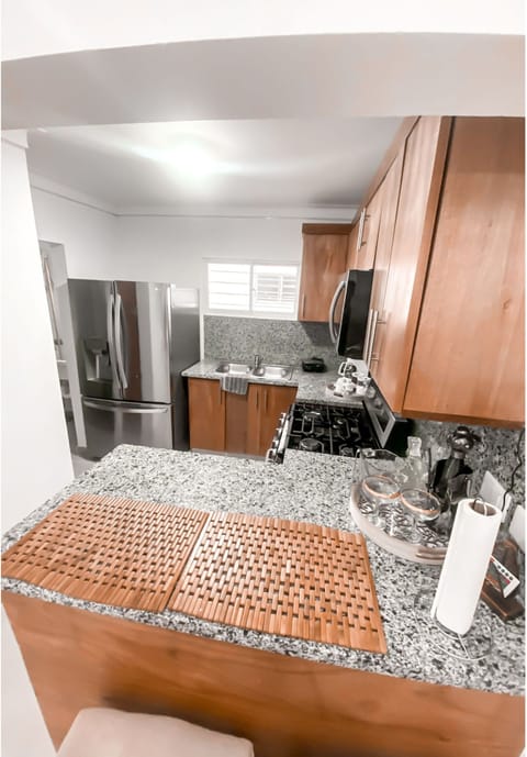 Comfort Apartment | Private kitchen | Full-size fridge, microwave, cleaning supplies