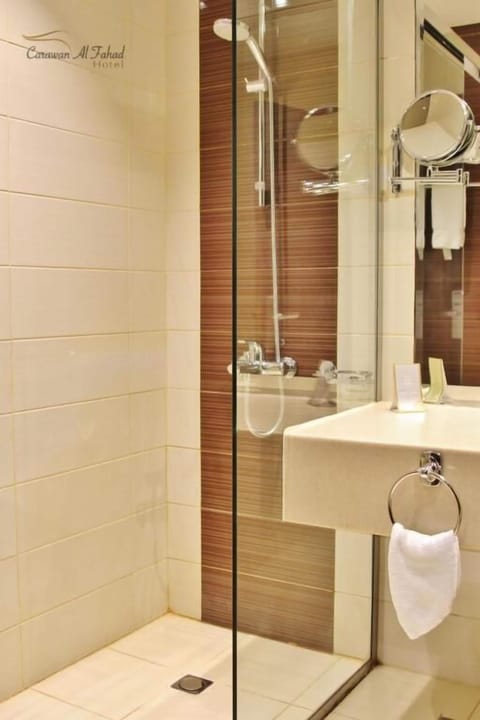 Deluxe Double Room | Bathroom | Hair dryer, slippers, towels, soap