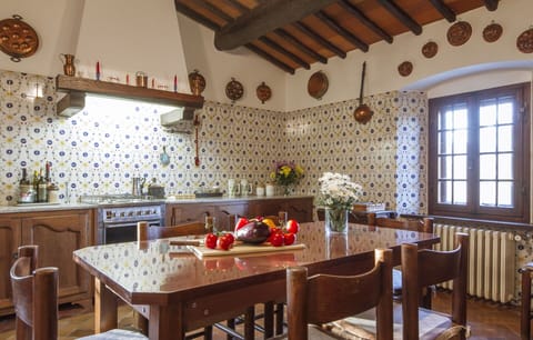 Table, Furniture, Property, Cabinetry, Countertop, Window, Wood, Interior Design, Lighting, Chair