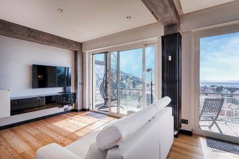 Apartment, Balcony, Sea View | Living area | 35-inch TV with digital channels