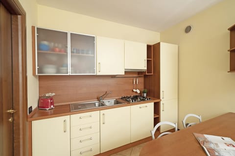 Apartment | Private kitchen | Fridge, microwave, stovetop, dishwasher