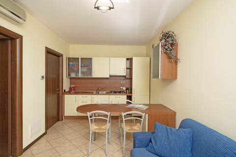 Apartment | Living area | 35-inch flat-screen TV with digital channels