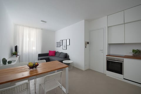 Apartment | Living area | 35-inch flat-screen TV with digital channels