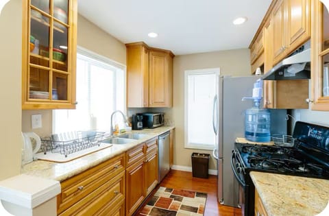 Fully stocked kitchen with cooking and dining essentials, Keurig Coffee