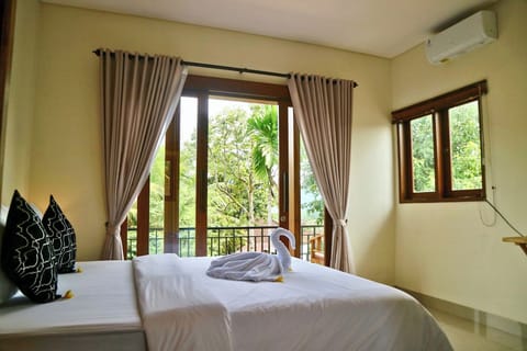 Deluxe Room, Garden View | Garden view