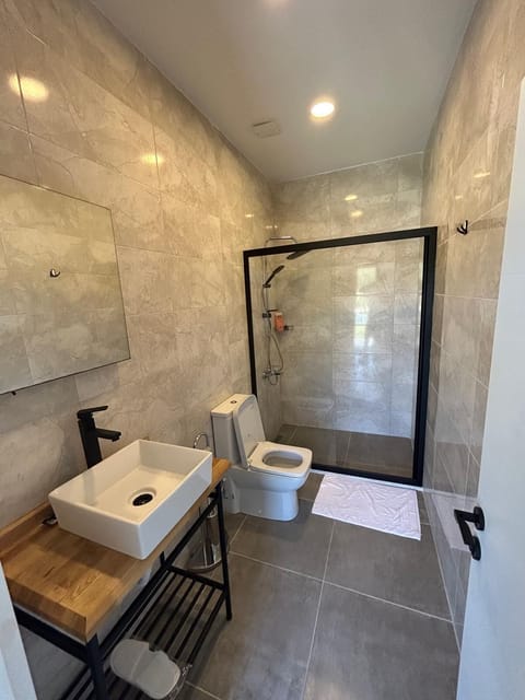 Deluxe Double Room, Courtyard View | Bathroom | Shower, towels, soap, toilet paper