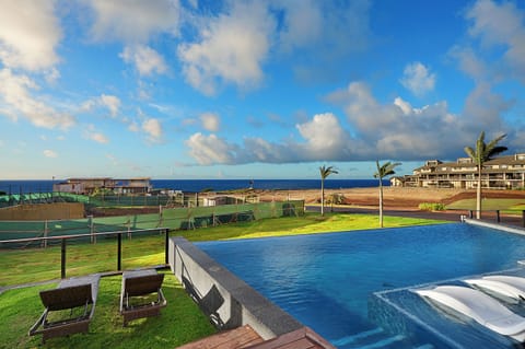 Enjoy the ocean and pool views from the lanai.