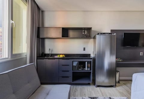 Apartment | Private kitchen | Microwave, stovetop, cookware/dishes/utensils