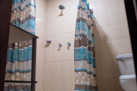 Comfort Triple Room, Balcony, Partial Ocean View | Bathroom | Shower, towels, soap, shampoo