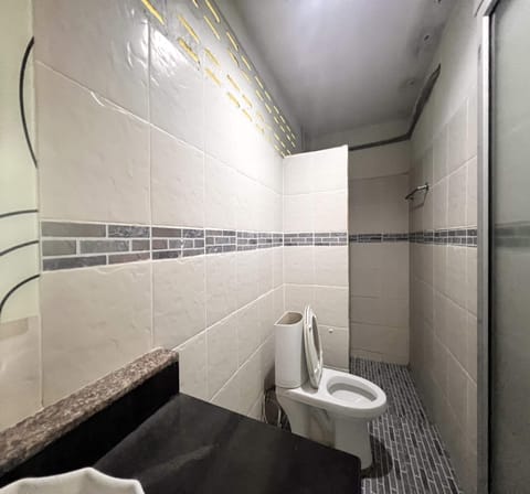 Standard Double Room | Bathroom | Shower, towels, toilet paper