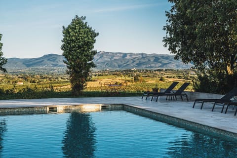 Seasonal outdoor pool, pool umbrellas, sun loungers