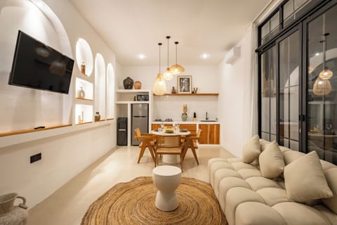 Deluxe Villa, Pool View | Living area | Netflix, streaming services