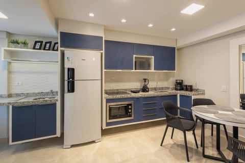 Deluxe Apartment, 2 Bedrooms | Private kitchen | Full-size fridge, microwave, oven, stovetop