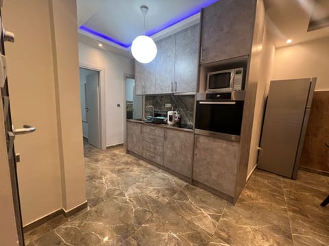 Apartment | Private kitchen | Fridge, microwave, oven, stovetop